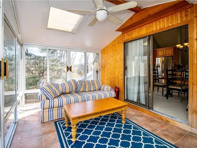 Sun Room #1/3-Season Dining Room right off kitchen, with steps down to backyard - 15.5' x 9.5'