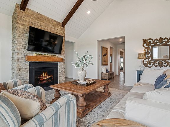 Great room with shiplap ceiling treatment