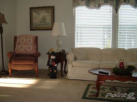 SPACIOUS LIVING ROOM VIEW FROM THE KITCHEN