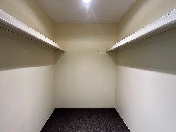 Large walk in closet for ample storage.
