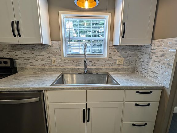 Deep sink with window above