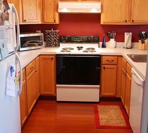 Kitchen with new hardwood floors and new light fixtures