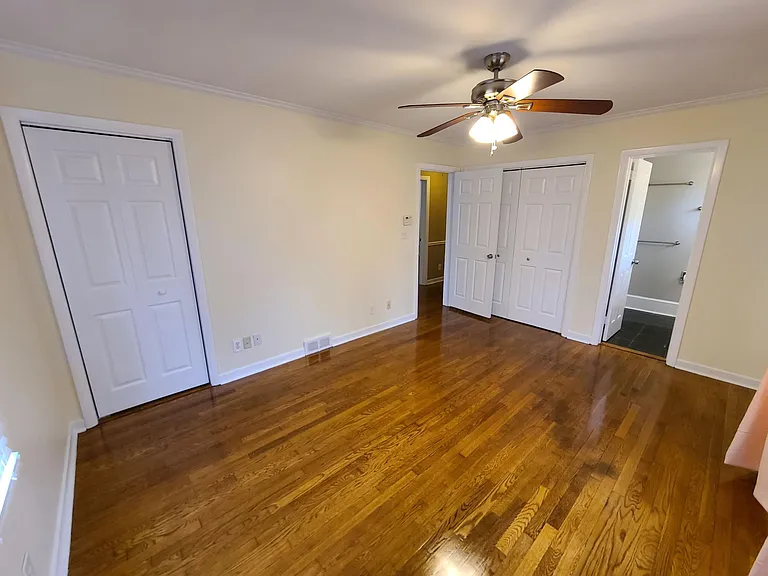 Two closets in the main bedroom.