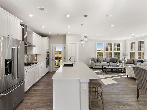 Kitchen Open to the Gathering and Dining Rooms