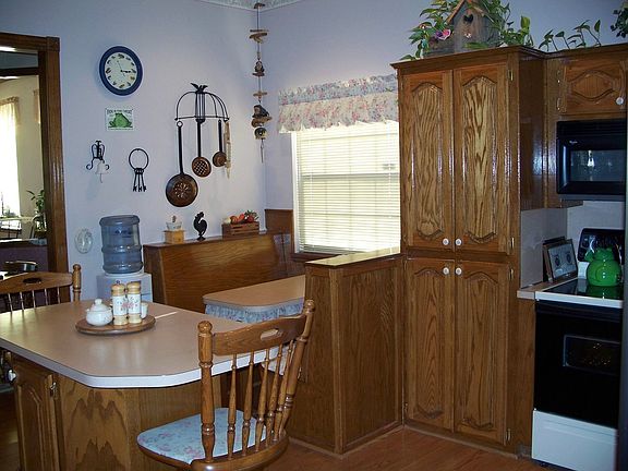 Another view of kitchen; shows you the built-in booth.