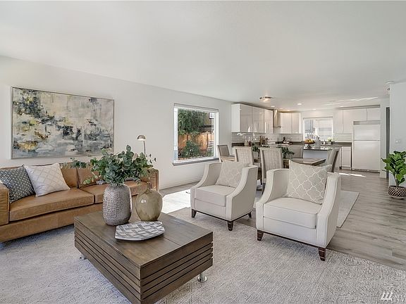 Welcome to this elegant and most stylish turn key ready home. The second level living Space offers natural light (From all those windows) and a open floor plan will wow you! All new wood like plank flooring and interior paint.
