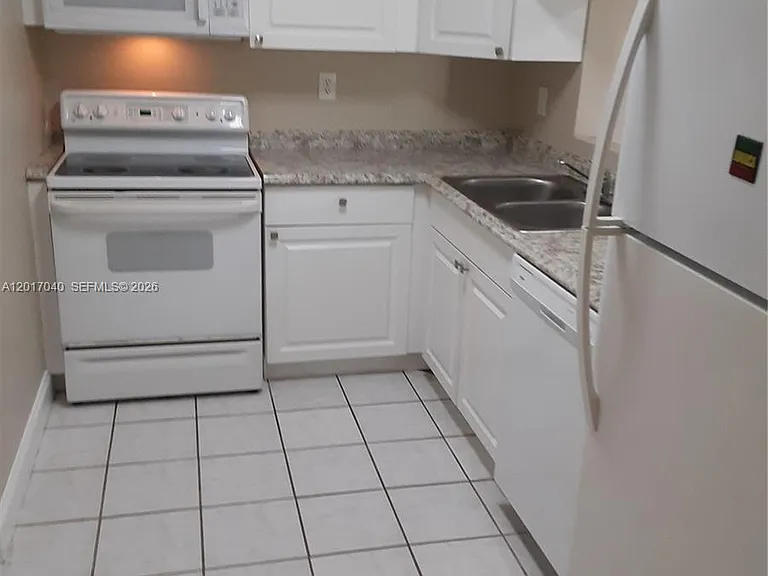 2713 NW 47th Ter #504 — Photo 3
