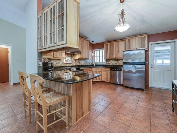 Spacious kitchen with gas range, large walk-in pantry and plenty of cabinets