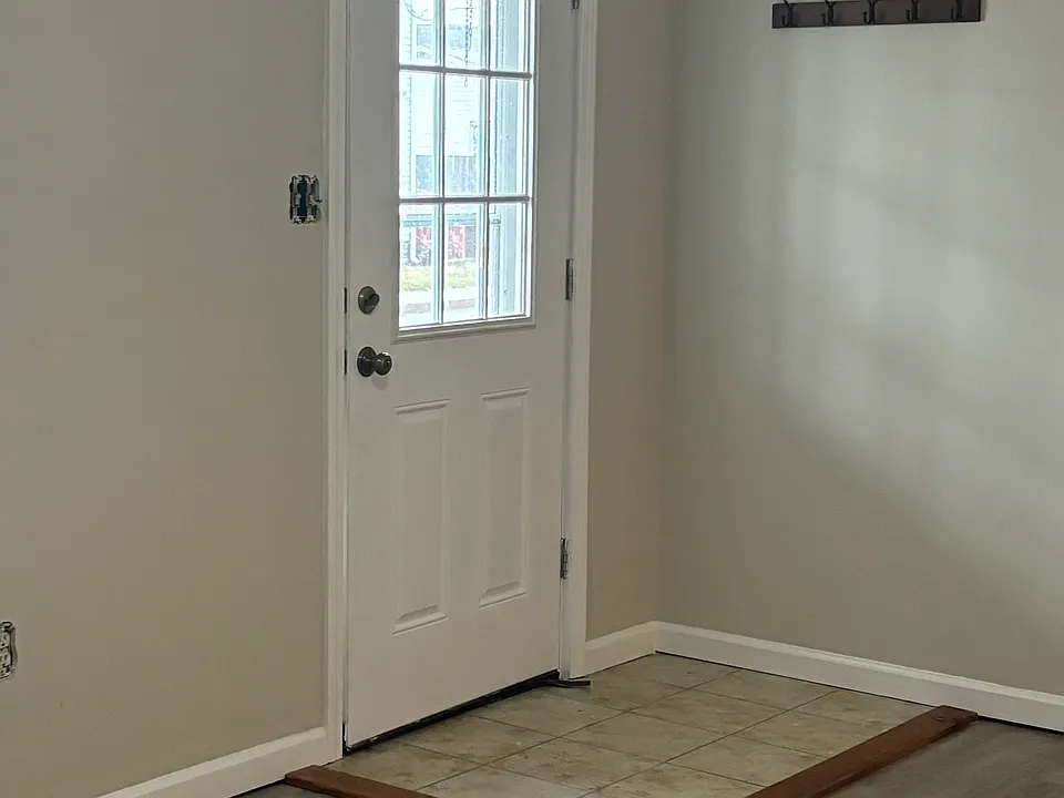 Front door inside living room