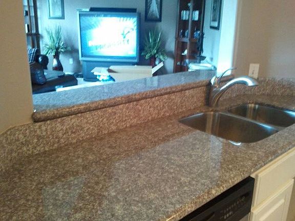 kitchen oversees living area
