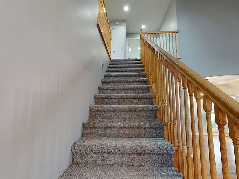 Staircase to loft area and bedrooms