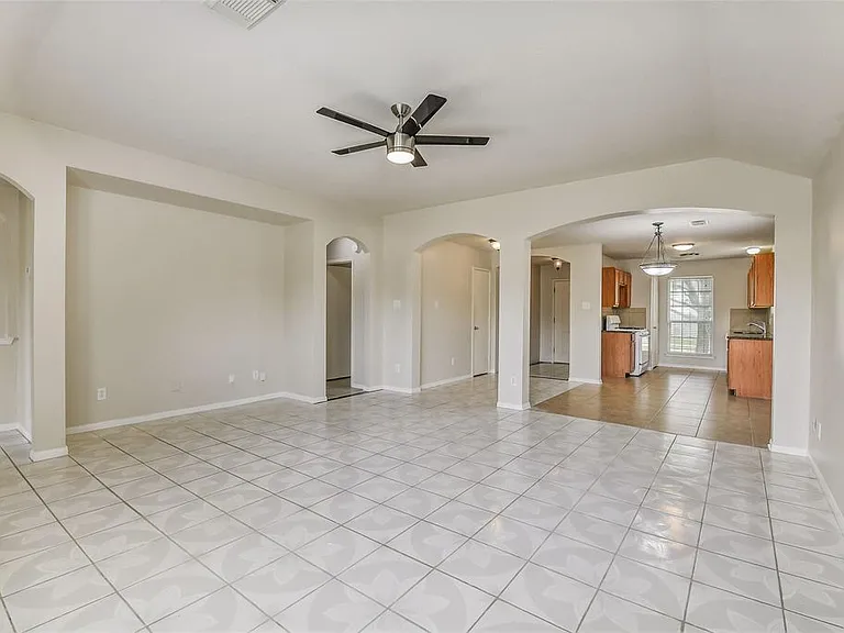 View from living room to dining area and kitchen