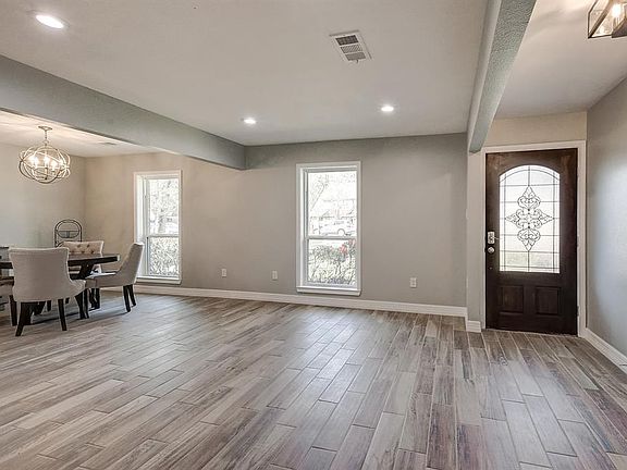 Make this a formal living room, a sitting area or a dining room.