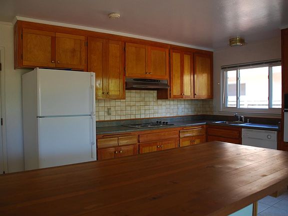 Kitchen. Butcher block island with four chairs for casual dining