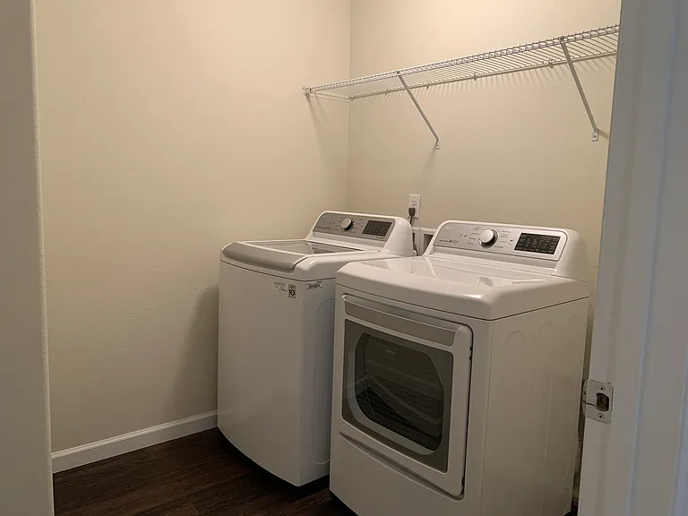 Laundry w/ White LG Washer & Dryer (included)