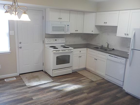 Kitchen is 13 x 11 and is equipped with a dishwasher, stove,