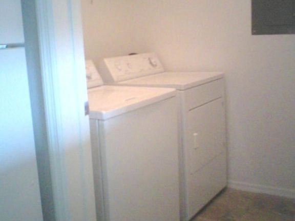 washer/dryer off kitchen
