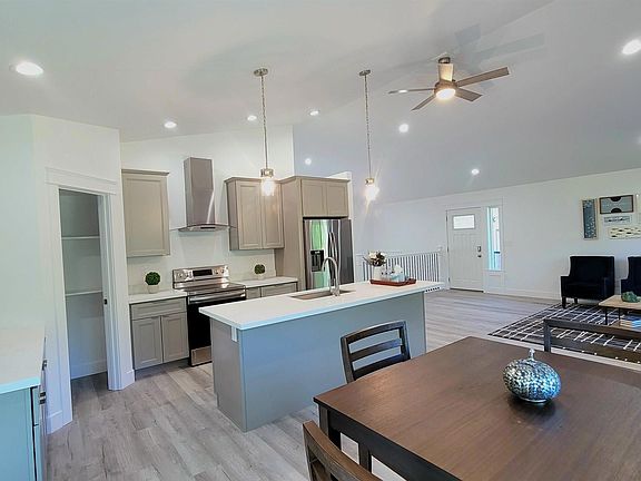 modern kitchen with all stainless steel appliances