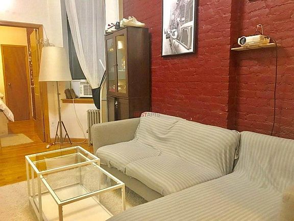 5th image of 261 E 10th St APT 1b
