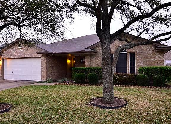 An Evening photo shows the warmth this home has to offer!