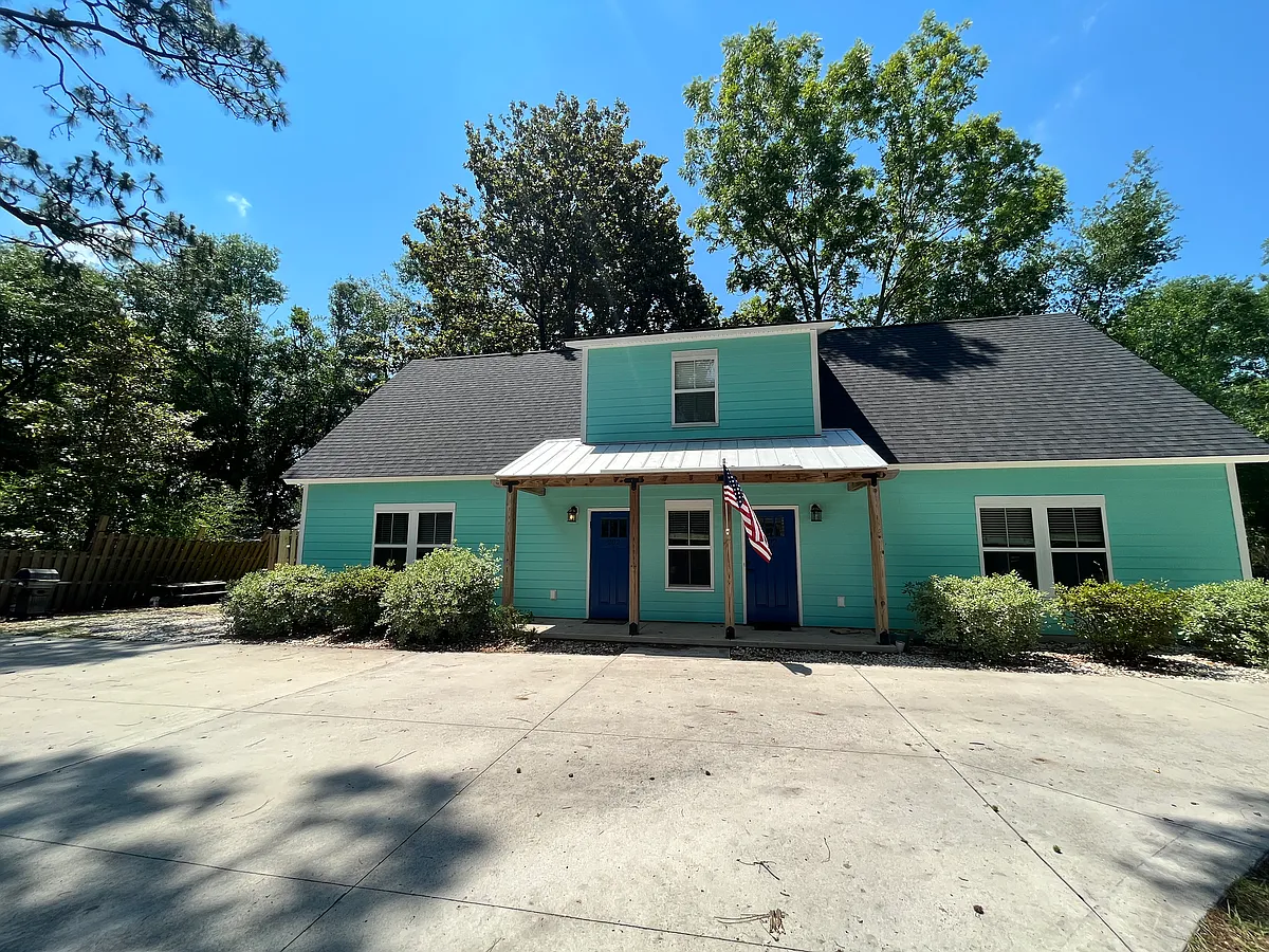 The door on the left is the upstairs unit. - 202 Dixie Ave #A