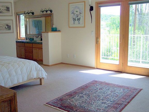 enjoy the views from romantic master suite