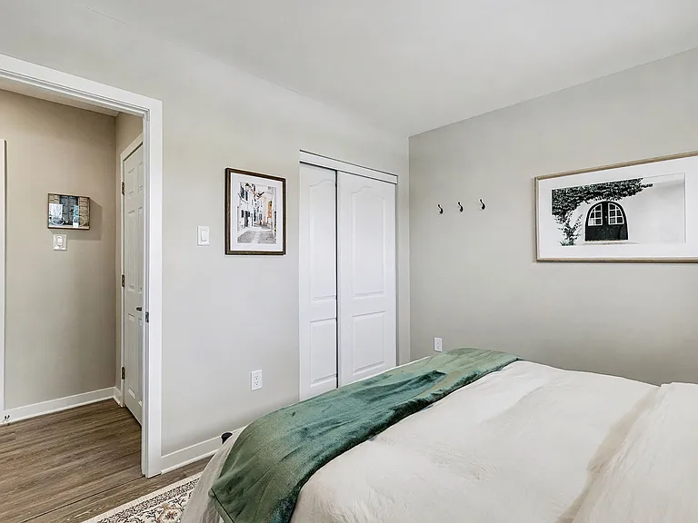 Ample closet storage in the comfortable primary bedroom of our Ottawa furnished accommodation.