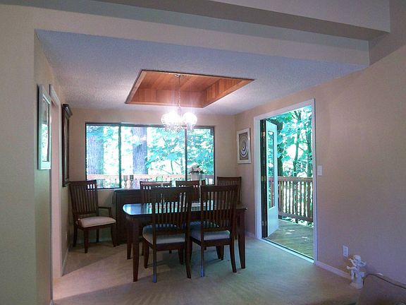 Formal dining w/French doors to wrap around deck