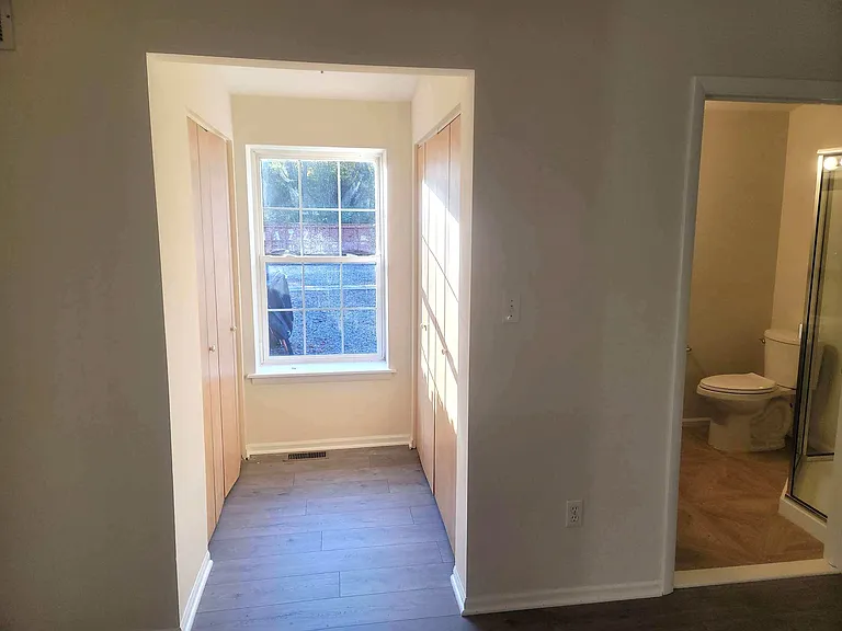 His/Hers closets in primary bedroom