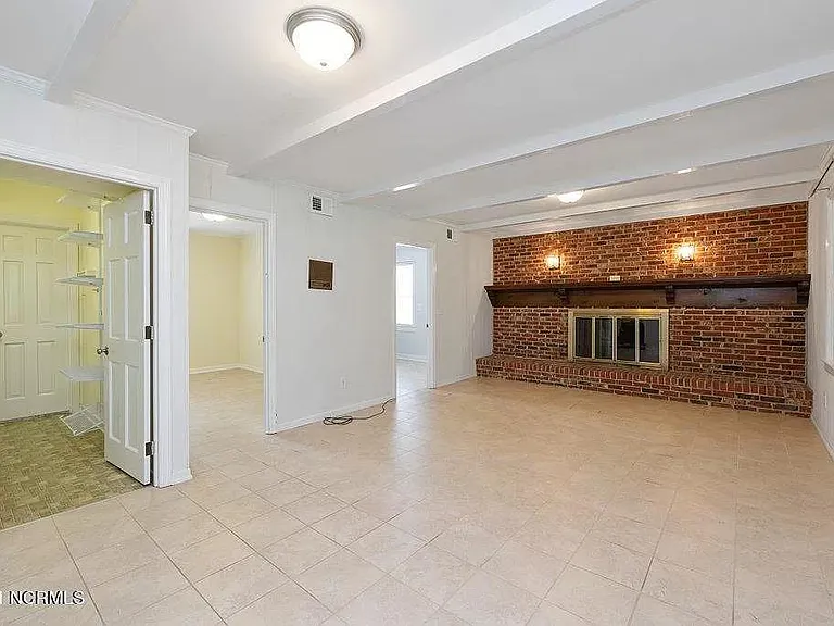 Family room w/laundry room, storage room, and large mud/storage room