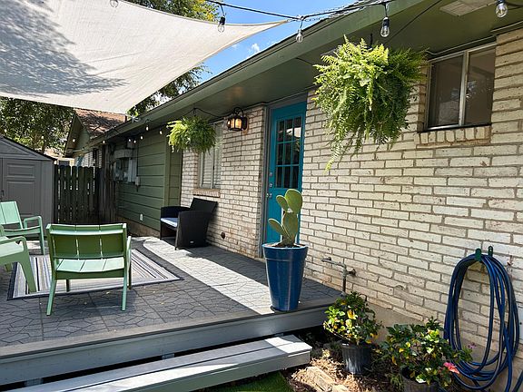 Sun shade and string lighting sets a festive mood