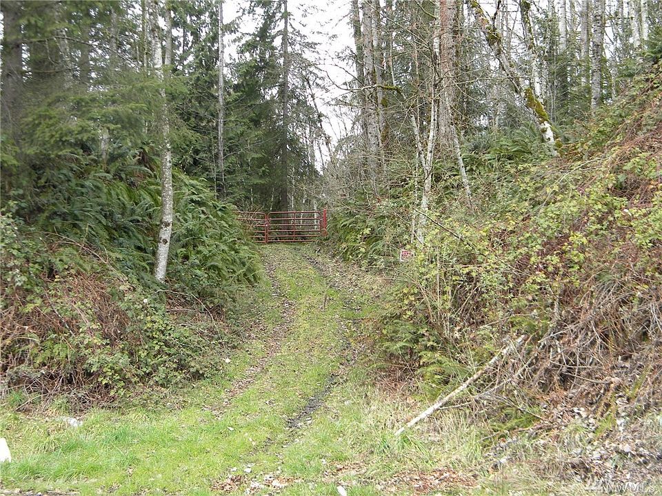 View of Gate from Green Valley Road.  Room to park on River Side of Road. Easy walk thru the gate - Follow the path/road as it winds around to the top - several spots for view and homesite placement.