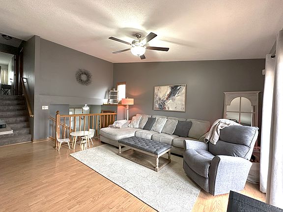 Main-level family room offers a warm and inviting space for relaxation and gatherings.