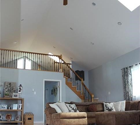Living area, vaulted ceilings and skylights