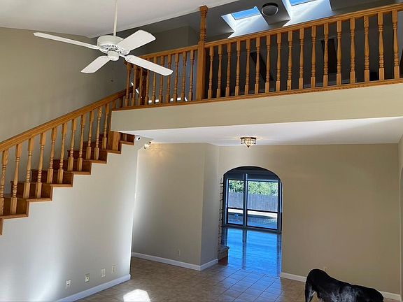 Access from Sunroom/Entry to large upstairs Loft.
