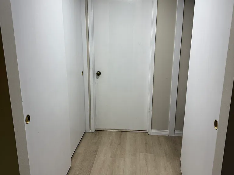 Ample closet space. Hanging rods and shelves in closets.