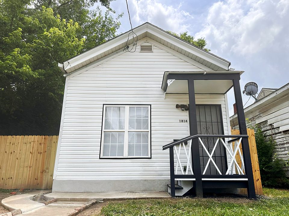 Welcome home to a freshly updated exterior and inviting front porch.