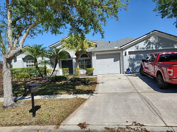 Large 3 car garage with parking for 3 more cars in driveway.