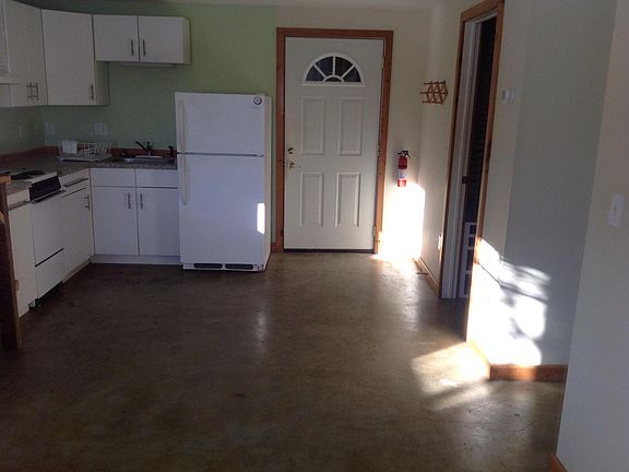 kitchen area and apartment entrance