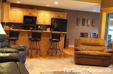 Open concept living room/kitchen/dining