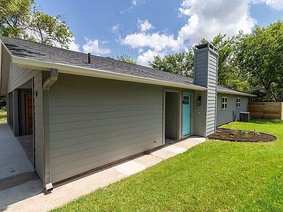 Garage faces the street, and entrance is on the side. Great privacy feature.