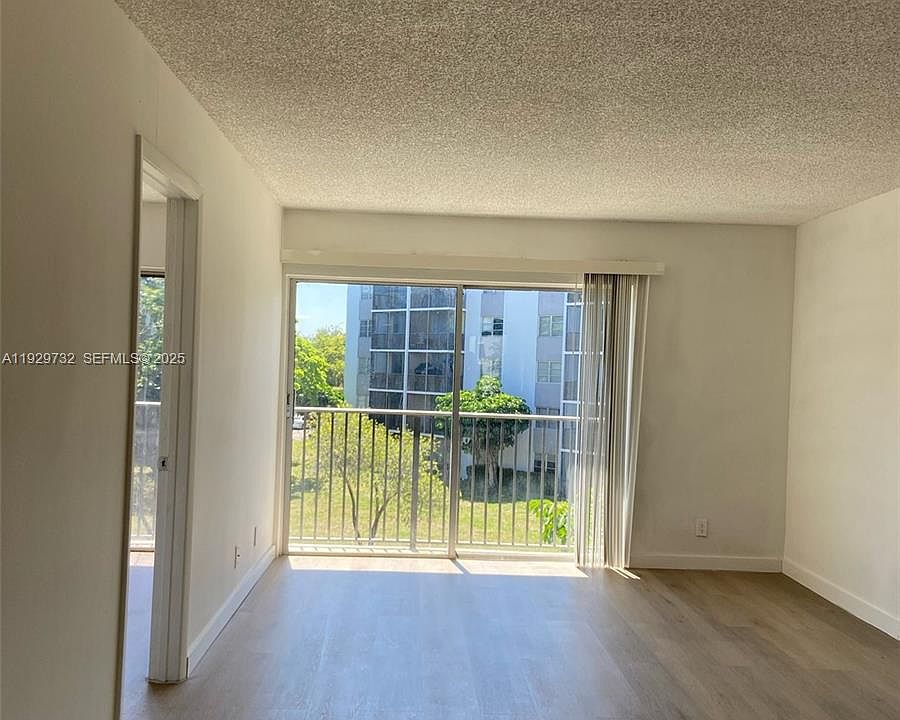 1st image of 8740 N Sherman Cir APT 305