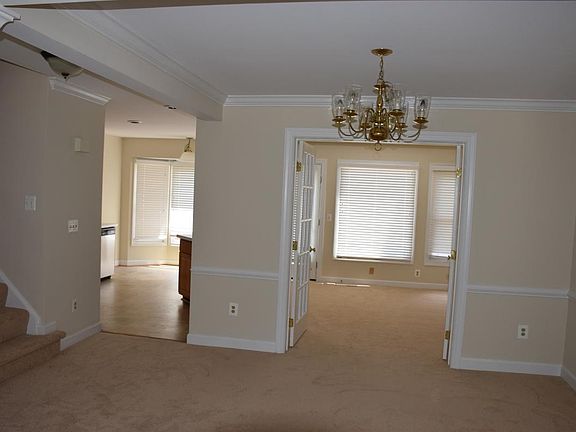 view from dining room into kitchen/room off kitchen