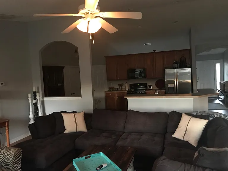 Living room view towards kitchen