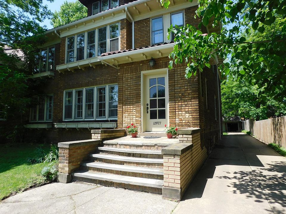 Front entrance with mail boxes inside.