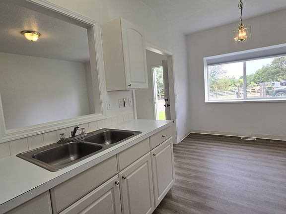 Kitchen Dining area with view outside.