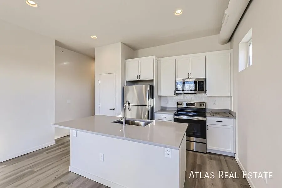**One Month Free | Modern One-Bedroom With Private Balcony, In-Unit Laundry & Central Ac** — Photo 1