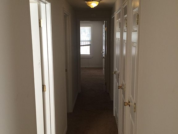 Hall way to the 3 bedrooms