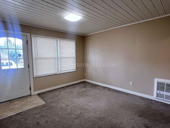 4th image of 7369 SE Evergreen St #0