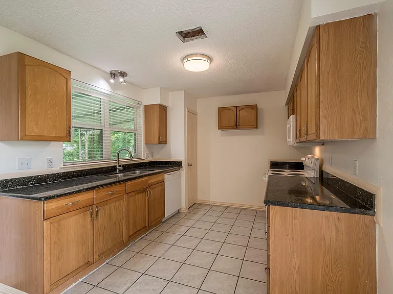 13402 T C Jester Blvd — Photo 3
